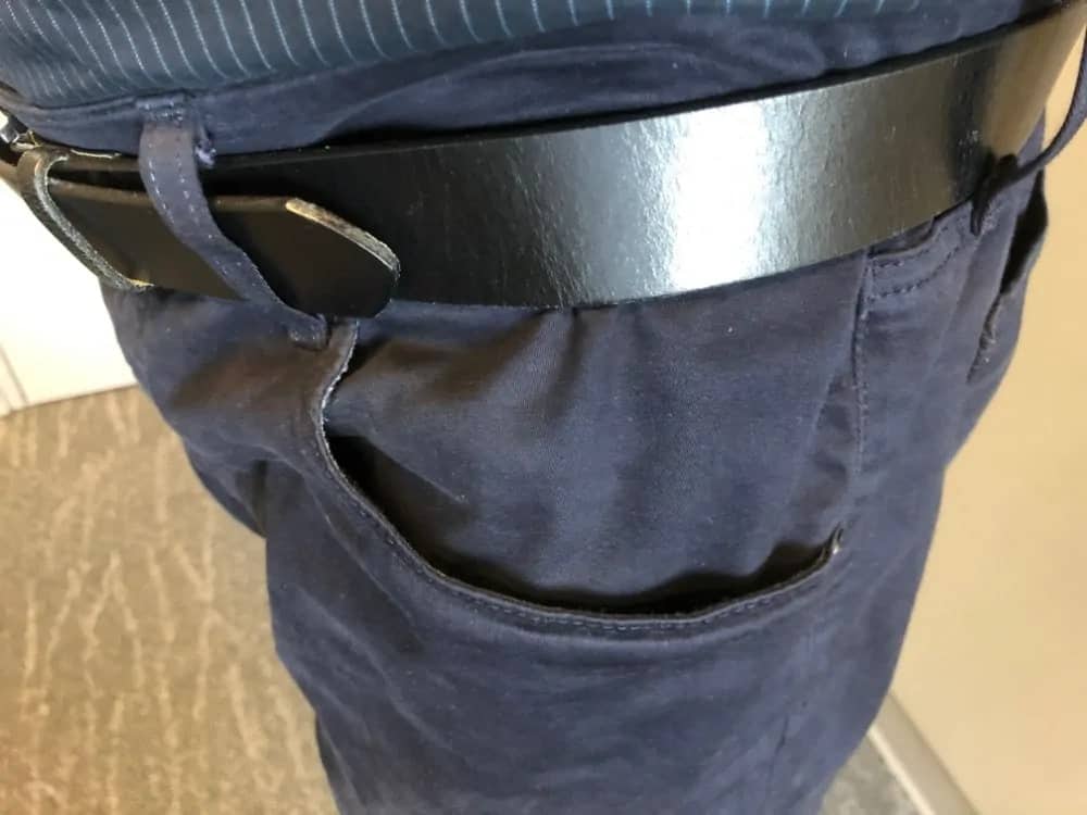 Close up photo of side pocket on AG jeans for men.