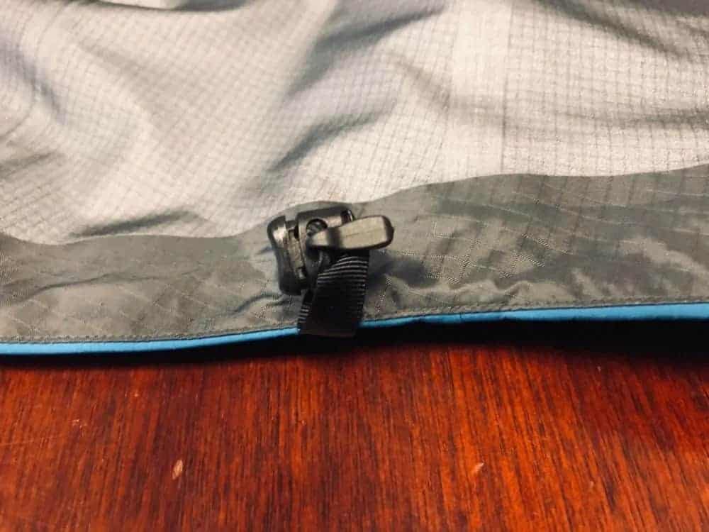 Bottom waist adjustment for Arc’Teryx Beta LT jacket.