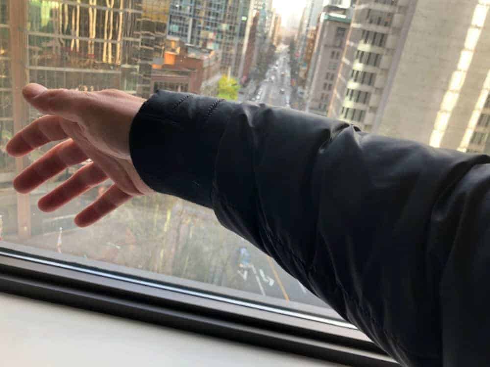 A photograph depicting the Canada Goose jacket arm length.