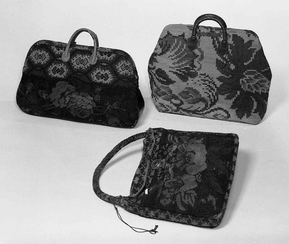 Black carpet bags