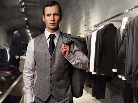 A businessman wearing a vest.