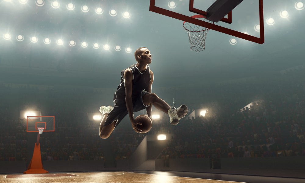 Basketball player scores a goal during a game.