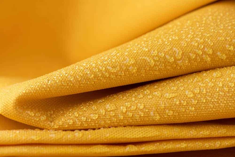 A close look at a yellow water-repellant material.