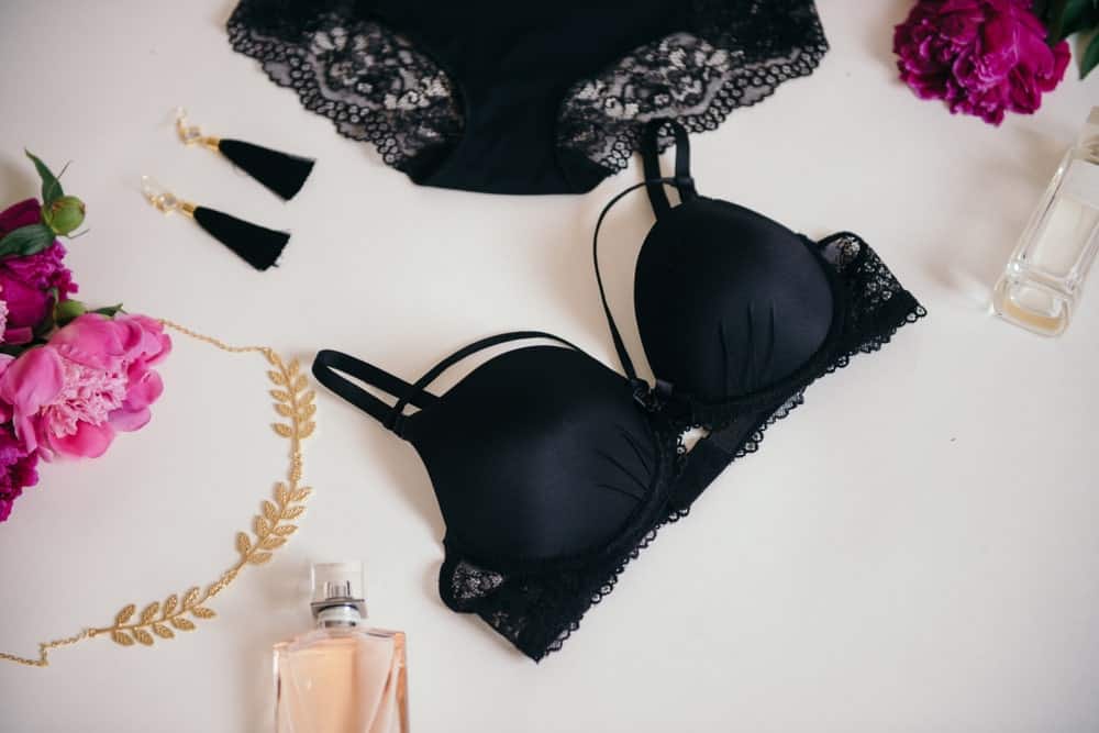 A close look at a piece of black lace bra.