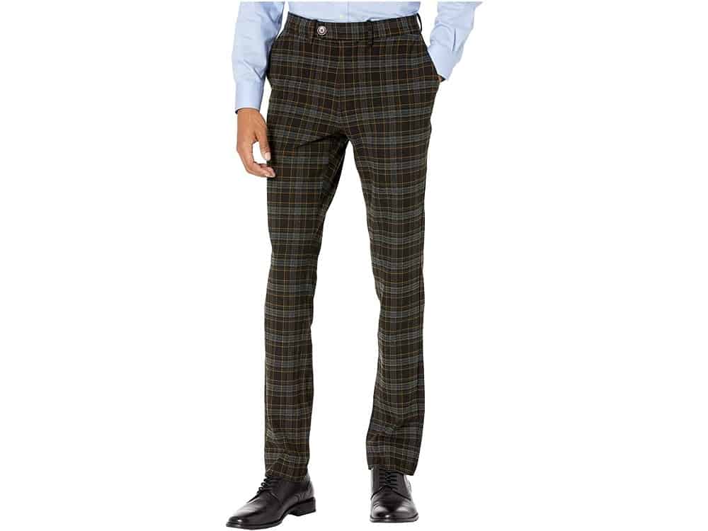Close look at a man wearing a pair of plaid flannel chinos.