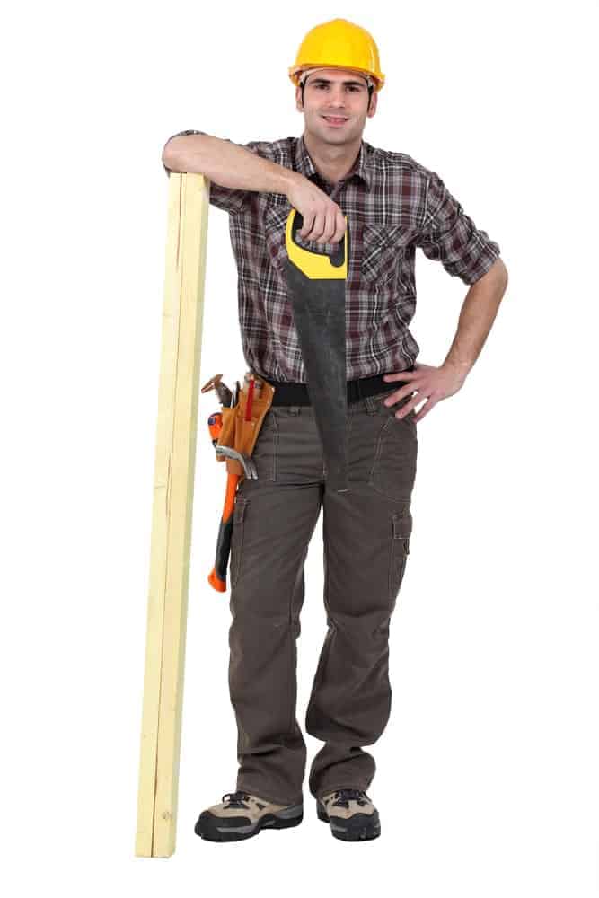 A close look at a contractor wearing khaki cargo pants.