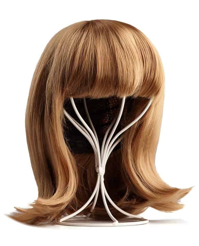 Natural-looking blonde wig with bangs.
