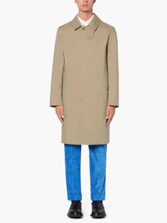 Man wearing mackintosh jacket.