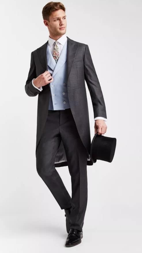 Man wearing a morning coat.