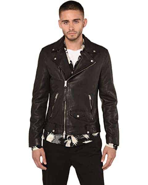 Man wearing a motorcycle jacket.