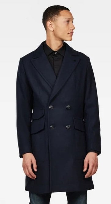 Man wearing a paletot jacket.