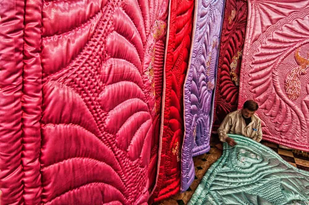 Large puff quilts on display.