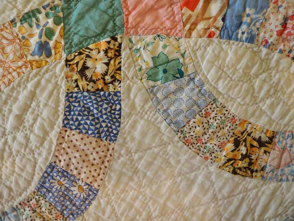 A close look at a colorful album quilt.