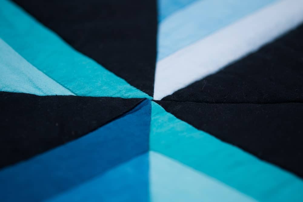A close look at a an amish quilt.