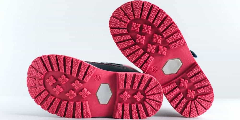This is a close look at the sole of a pair of running shoes.