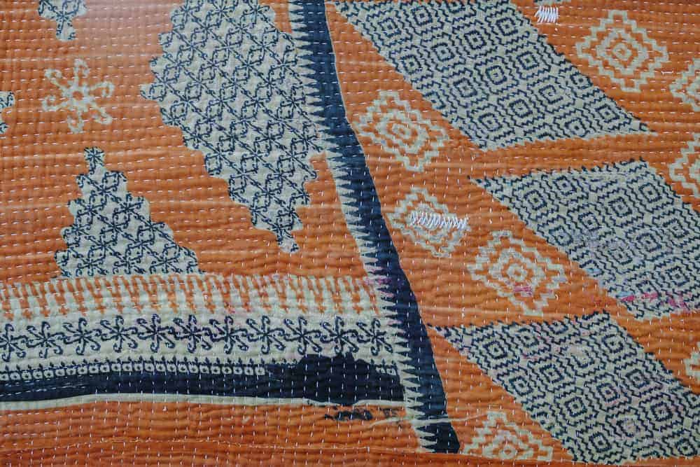 Pre-quilted fabrics with various patterns.