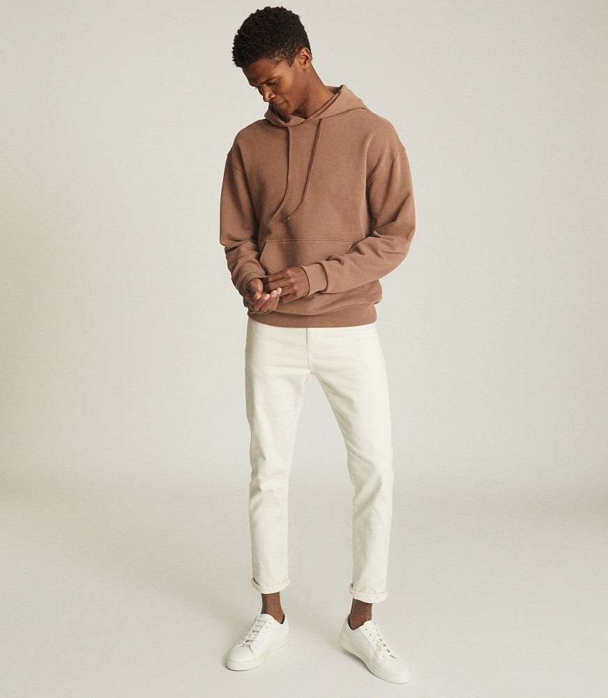 The Reiss Field Oversized Hoodie in rust orange.
