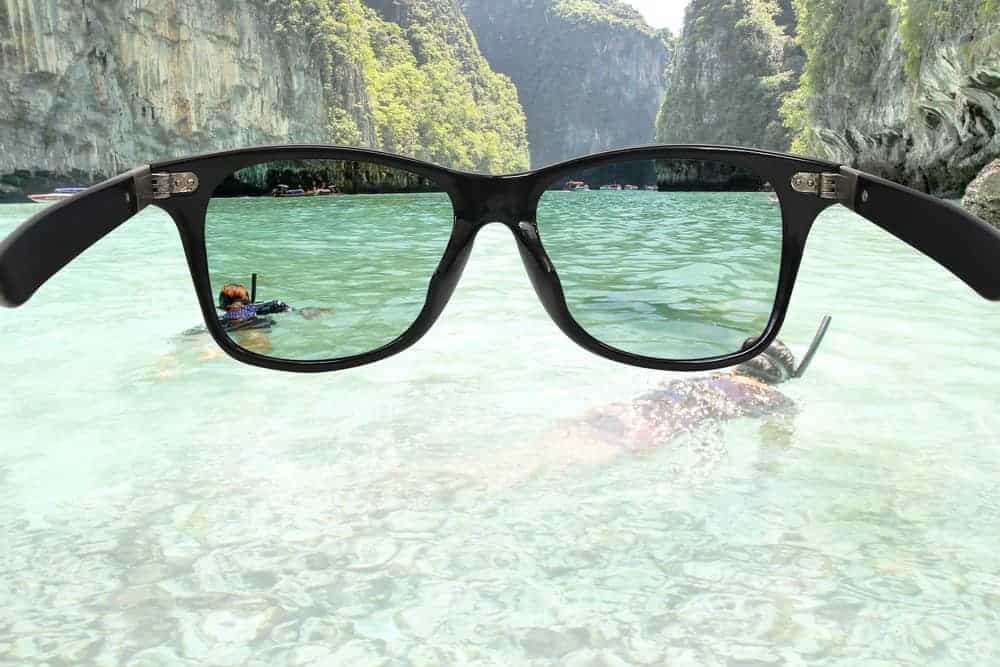 This is a close look at how a pair of polarized sunglasses affects the sight and filtering of light.