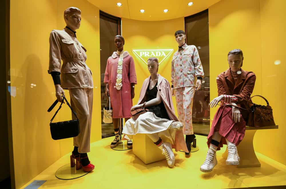 This is a close look at the boutique display of a Prada storefront.