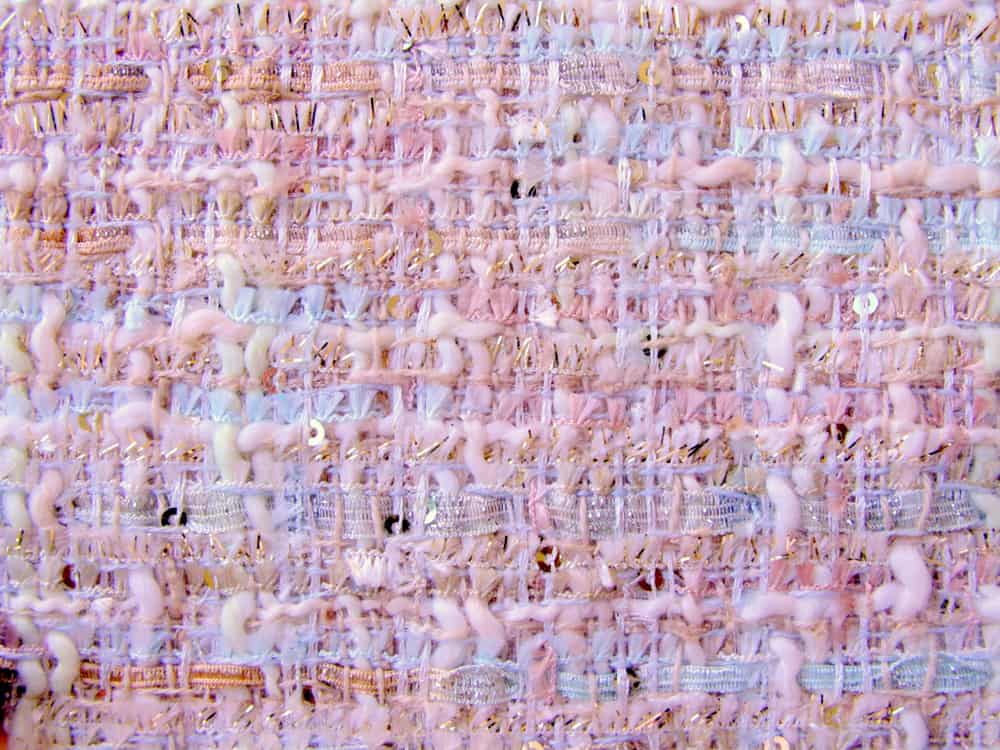 This is a close look at a tweed fabric.