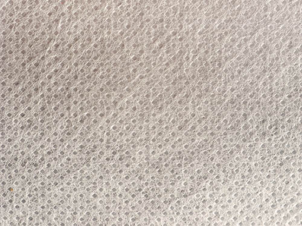 This is a close look at a white nonwoven polypropylene fabric.