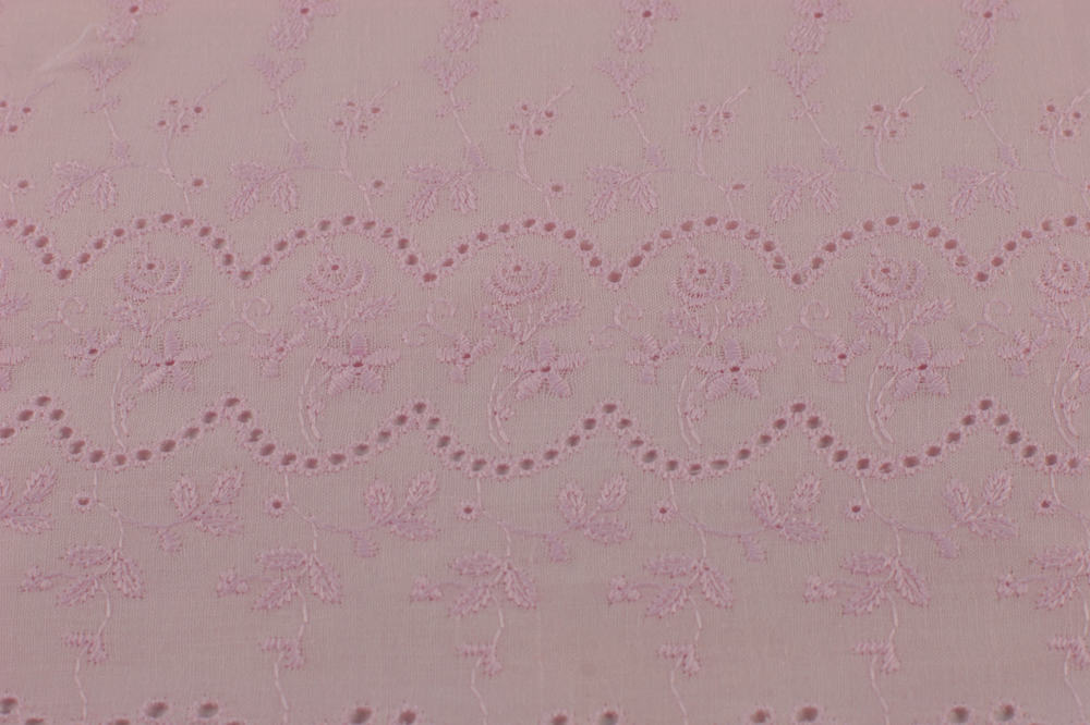 This is a close look at a textured Eyelet fabric.