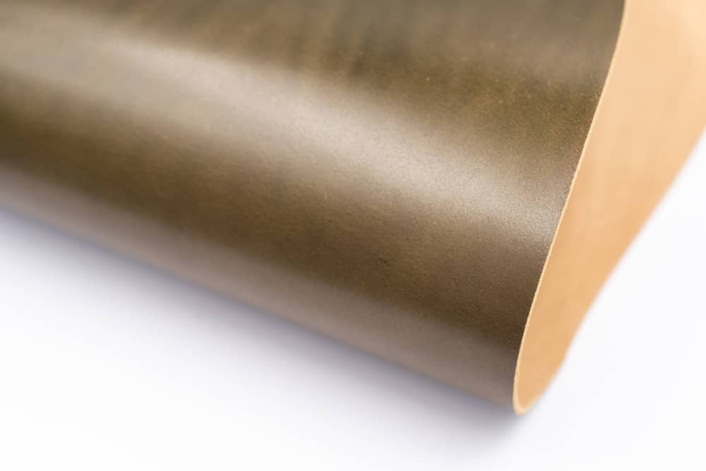 This is a close look at an Olive Green Colored Glazed Shiny Shell Cordovan Leather.