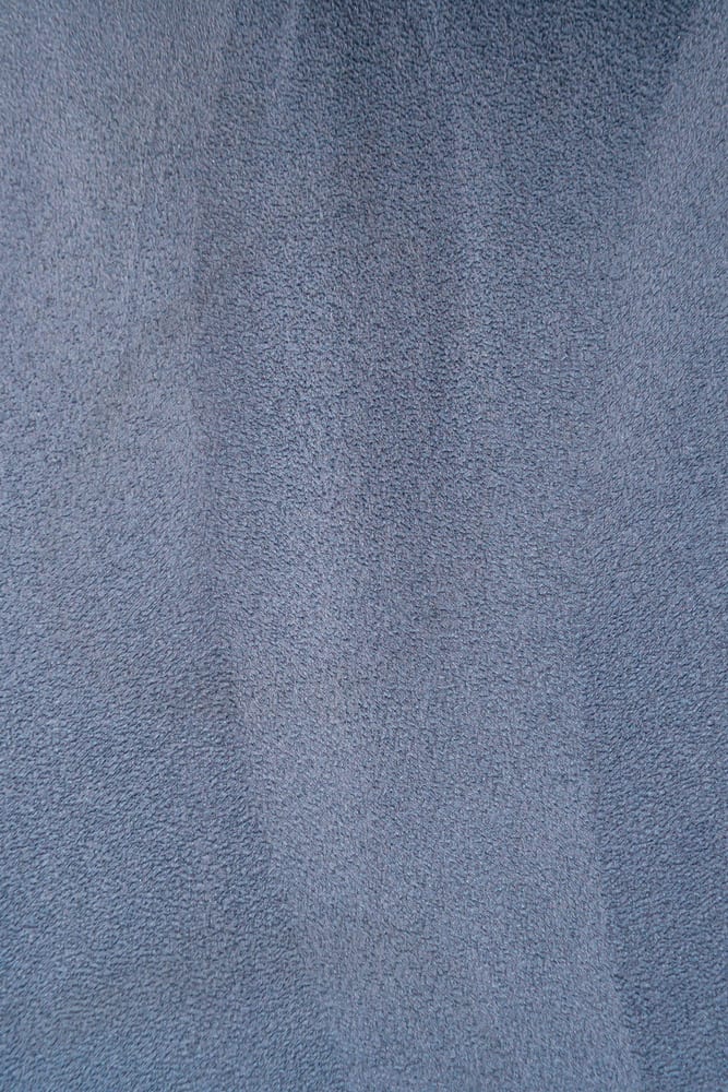 This is a close look at a blue gray velour leather.