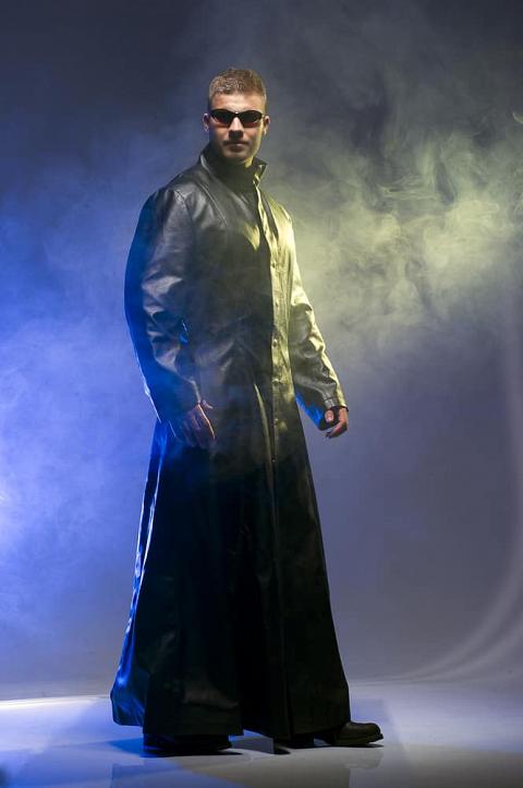 Man donning a matrix style look.