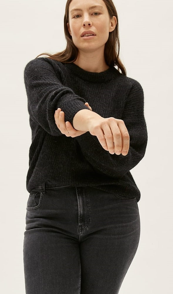 The oversized black crew alpaca sweater from Everlane.