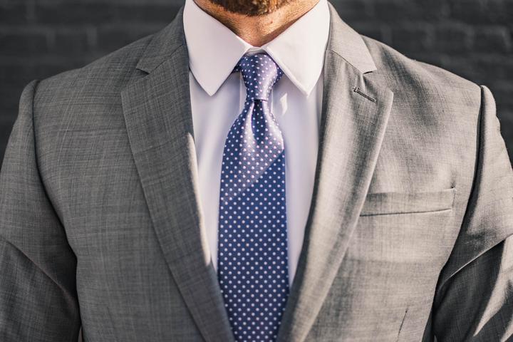 The Navy blue woven pindot tie from Foundation Menswear.