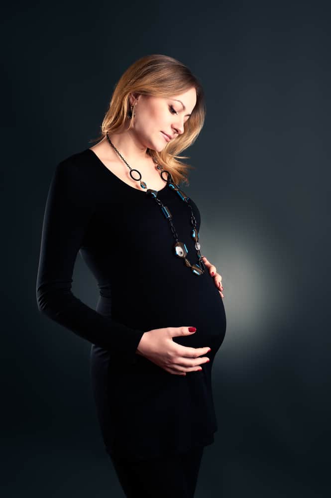 This is a woman wearing a black dress.