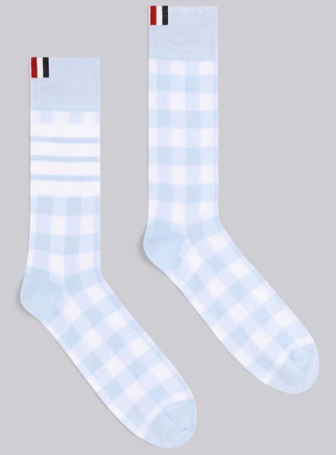 THE LIGHT BLUE MERCERIZED COTTON GINGHAM JACQUARD MID-CALF SOCKS From Thom Browne.