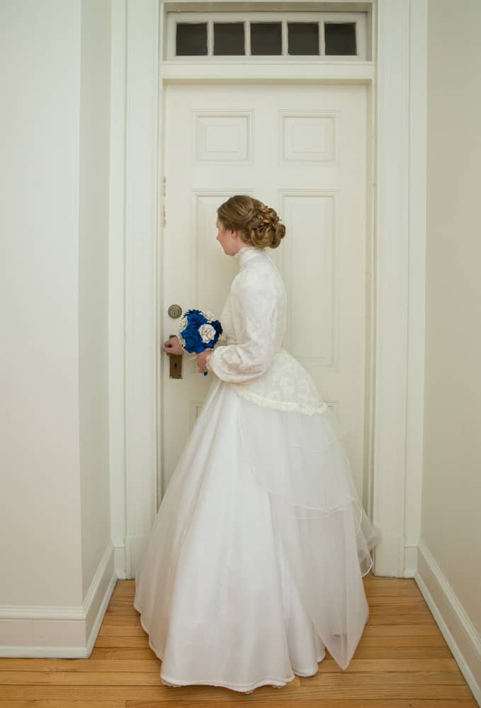 Young bride in a vintage wedding gown.