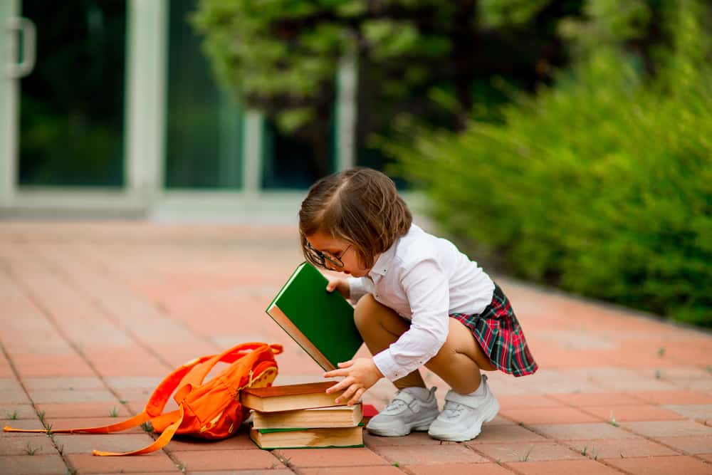 A girl wearing a school uniform.