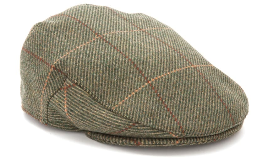 This is a green flat cap beret with a tweed pattern.