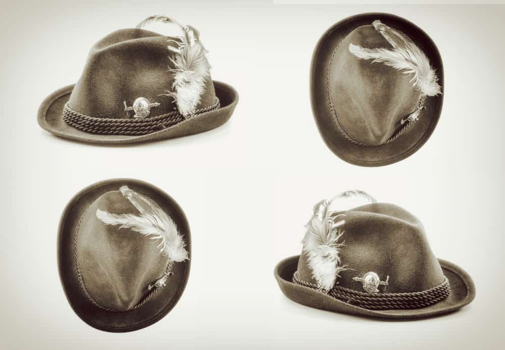 This is a gray felt Alpine Hat with brown rope and feather in different angles.