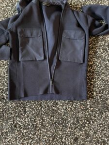 Two front chest pockets on the Elgin Knit Hoody by Canada Goose