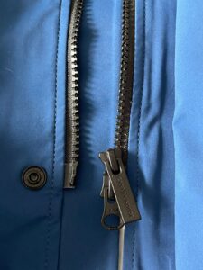 Close up view of zipper for Canada Goose rain jacket